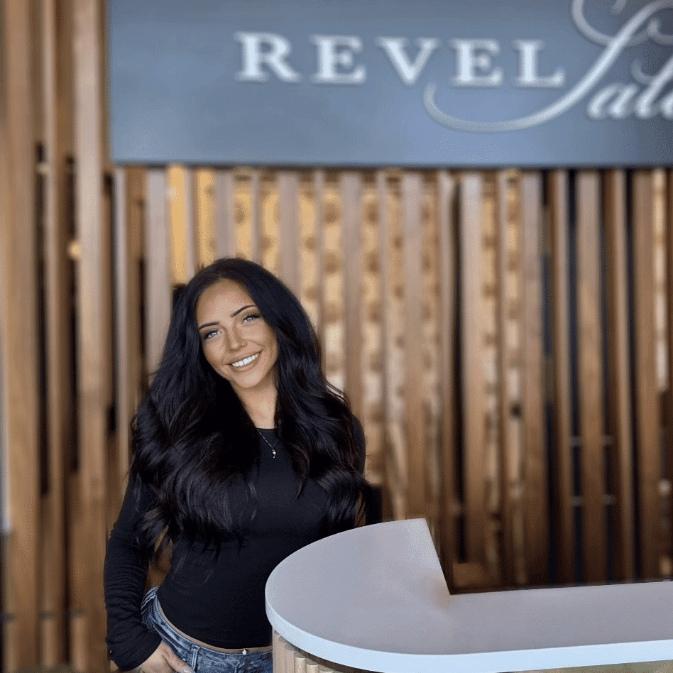 Portrait of Olivia Sokhachev, a professional stylist at Revel Salon, showcasing their expertise and style.